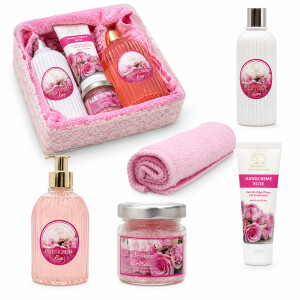 Rosa Wellness Geschenkkorb mit Rose-Pflegeprodukten und flauschigem Handtuch als dekoratives Beauty-Geschenk f&uuml;r Frauen und entspannte Verw&ouml;hnmomente